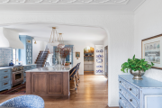 Designer Tiffany Skilling wove family history into this remodel by using a bureau and china inherited by its owners as inspiration.