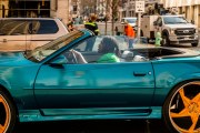 Images from downtown Indy's St. Patrick's day parade - a sports car