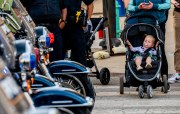 Images from downtown Indy's St. Patrick's day parade - a kid in a stroller