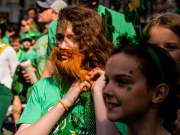 Images from downtown Indy's St. Patrick's day parade - a bearded woman