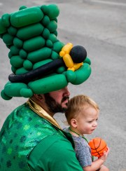 Images from downtown Indy's St. Patrick's day parade - a balloon hat