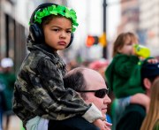 Images from downtown Indy's St. Patrick's day parade - a pouty child