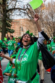 Images from downtown Indy's St. Patrick's day parade - a happy woman