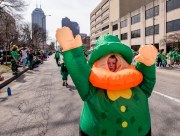 Images from downtown Indy's St. Patrick's day parade - person in inflated Leprechaun