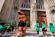 Images from downtown Indy's St. Patrick's day parade - kids and dino