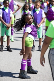 dancer in purple and green