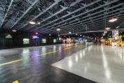 the expansive car garage floors gleaming