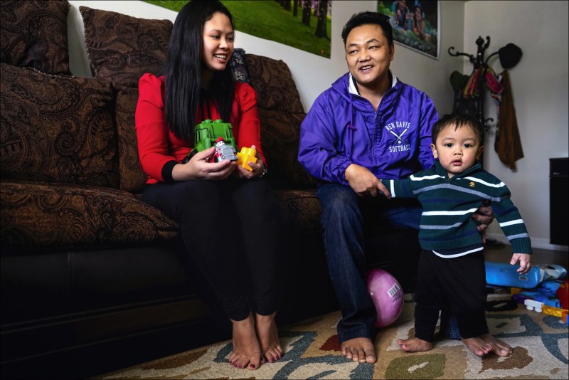 Chin Refugees of Indianapolis
Uber driver Van Biak Lian and his wife Run Tha Hlei Par (nick name Tha-Tha) play with their son Samuel in the Southport neighborhood on Indianapolis, where their live.  All are U.S. citizens.