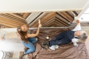 As seen on HGTV’s Good Bones, hosts Mina and Karen work on a feature wall in the front hallway of the home.