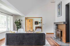 Hardwood floors and an open-concept layout make it easier for Derek Lavender to navigate the main living area from a wheelchair.