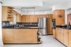 The accessible kitchen space honors its 1952 original design.