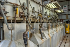 During peak times, Larry Wappel Sr., his sons and hired hands spend more than 50 hours a week on just the mint portion of the operation at Wappel Grain & Herb in San Pierre, Indiana. A big part of that time is spent in extracting the oil from the mint leaves. It's a delicate process that requires steam to rupture the glands on the leaves, vaporizing the mint oil. That vapor is then collected and run through condensers that cool it, returning it to a liquid form. Larry Wappel Sr., his wife Debbie and the couple's sons Larry Jr. and Eric run Wappel Grain & Herb in San Pierre, Indiana, a 9,000-plus acre farm operation in northwest Indiana.