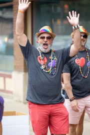 Photos from Indy Pride Parade 2022 a man cheers