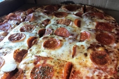 The hand-tossed traditional pizza at South of Chicago