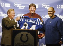 Dallas Clark is introduced as a member of the Indianapolis Colts. Then-general manager Bill Polian (left) and then-coach Tony Dungy (right) hold up no. 44