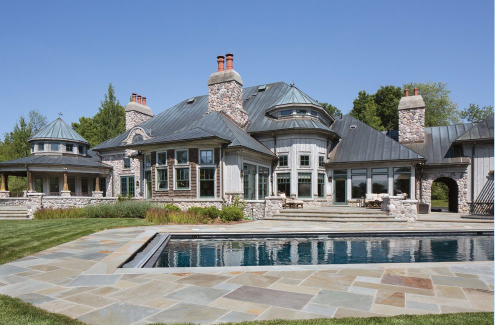 The original owners rinsed off their horses under the wide arch to the right of the house -- there