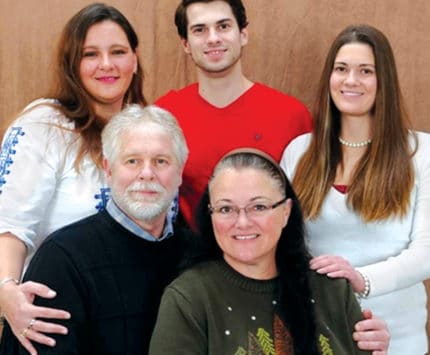 Aundrea Dailey (far left) was the first to suspect the Henry County cancer cases were linked. Her father, Paul Bridges (lower left), died of the disease in 2015.