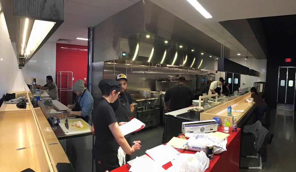 Rook employees readying the kitchen for today