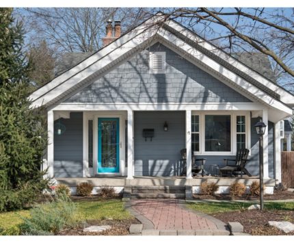 The home’s already-charming exterior wasn’t part of the renovation, but the new owners, Deborah Jacobs and Alan Leerkamp, put their stamp on it with a bright-blue front door.