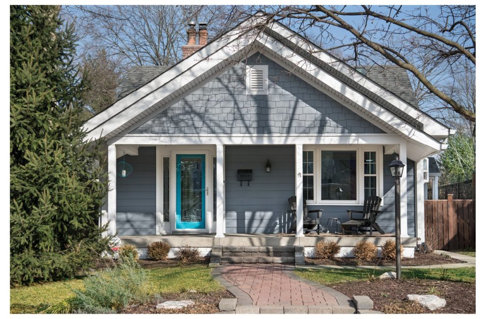 The home’s already-charming exterior wasn’t part of the renovation, but the new owners, Deborah Jacobs and Alan Leerkamp, put their stamp on it with a bright-blue front door.