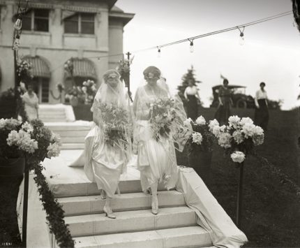 As seen on brides (and sisters) Alice and Margaret Landon, the dress length of the day revealed ankles in decorative silk stockings above bejeweled satin heels.