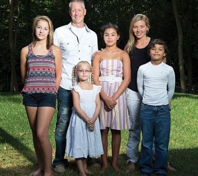 Shannon Raddin and Jade Walcott (right and center) with their family in Ohio.