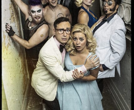 The cast of Rocky Horror Show, L to R, First Row: Tim Hunt (Brad), Betsy Norton (Janet). Second Row: Scott Keith (Frank N Furter), Joe Doyel (Rocky Horror), Erin Becker (Columbia), Joanna Winston (Eddie). Third Row: Claire Wilcher (Magenta), Craig Underwood (Riff Raff).