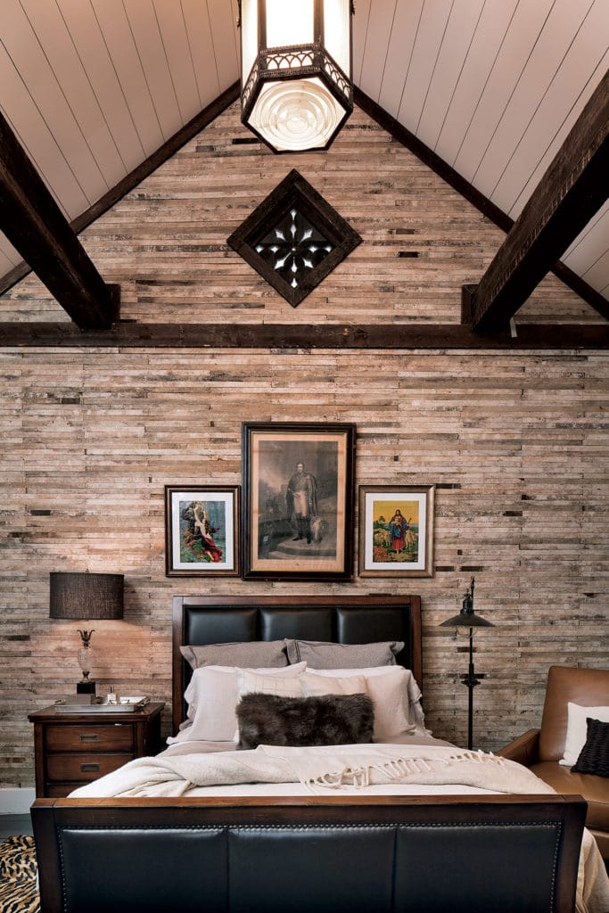 Dramatic master bedroom with cathedral ceiling.