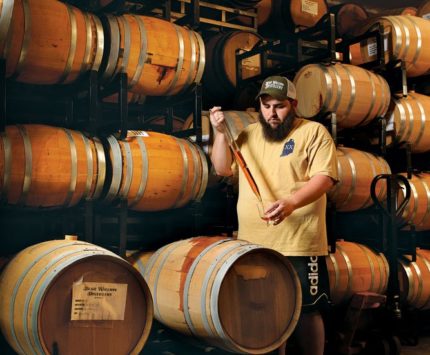 Taking a sample at Bear Wallow Distillery.