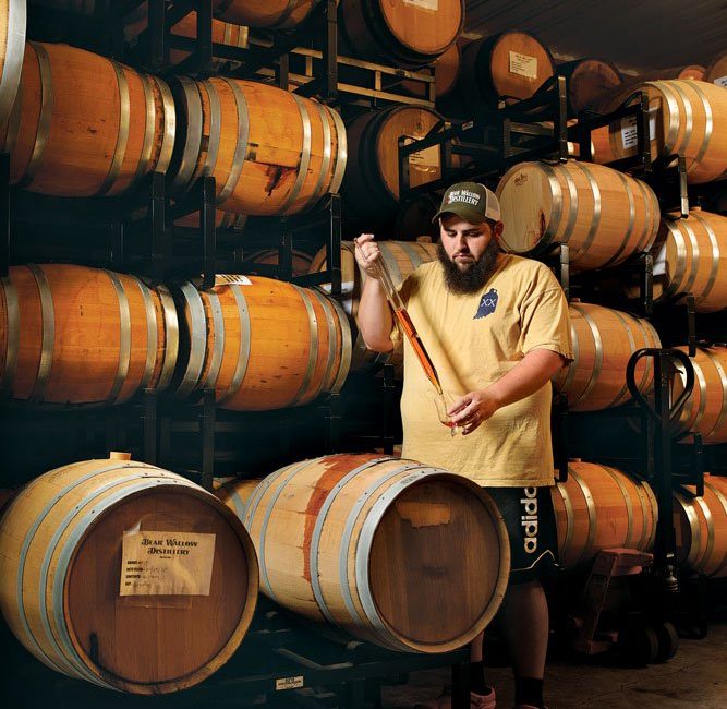 Taking a sample at Bear Wallow Distillery.