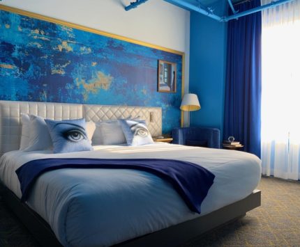 A hotel room adorned in blue hues