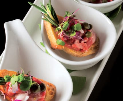 Stompin Barley appetizer with bread in white bowls