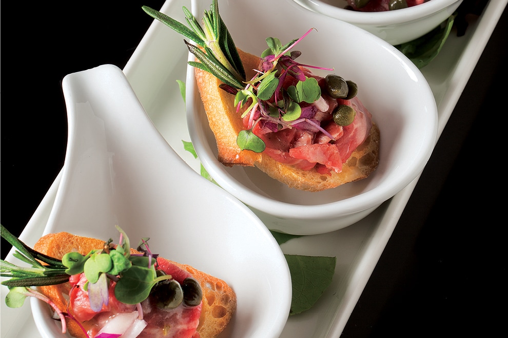 Stompin Barley appetizer with bread in white bowls