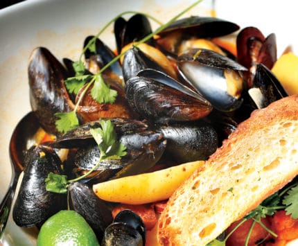 Mussels and bread in a bowl at Union 50