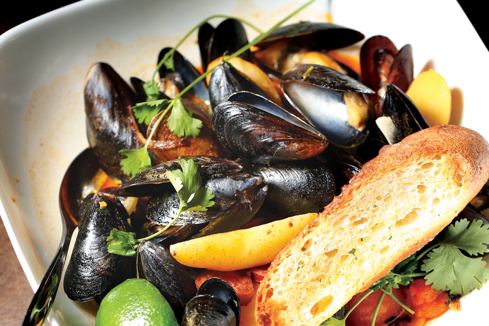 Mussels and bread in a bowl at Union 50