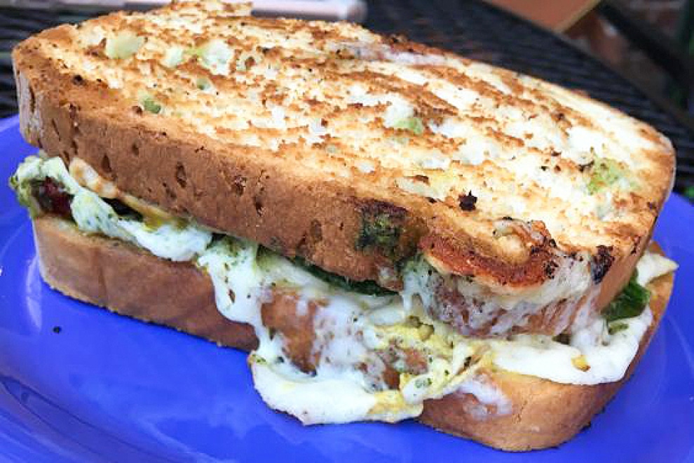 Hormone-free turkey crowned with mozzarella, sun-dried tomatoes, pesto and dijon mustard at Vitality Bowls