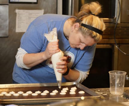 making a baked good at Circle City Sweets