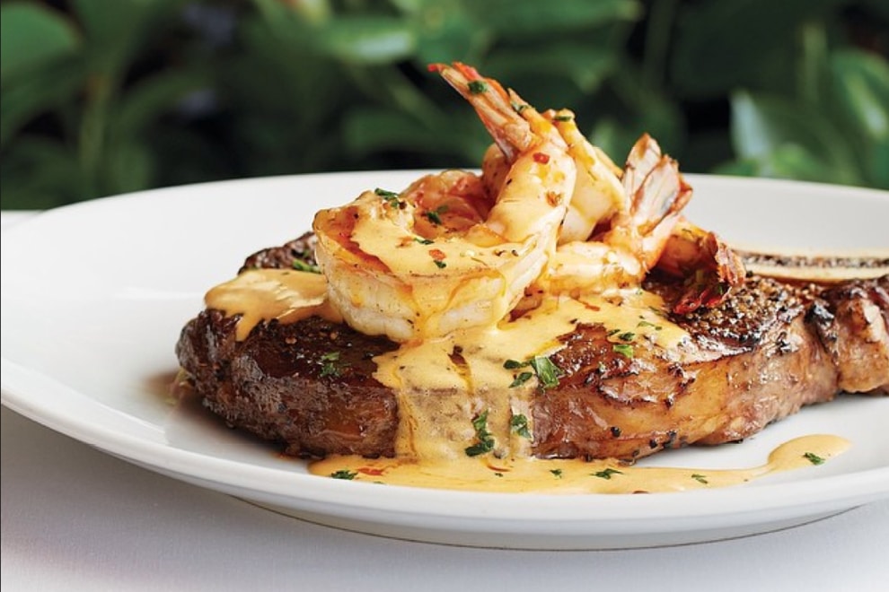 Bone-in ribeye with baked shrimp from Fleming's