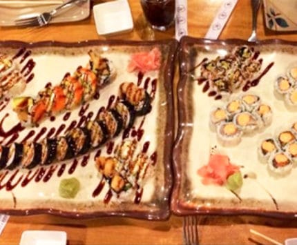 Sushi on platters at Sapporo