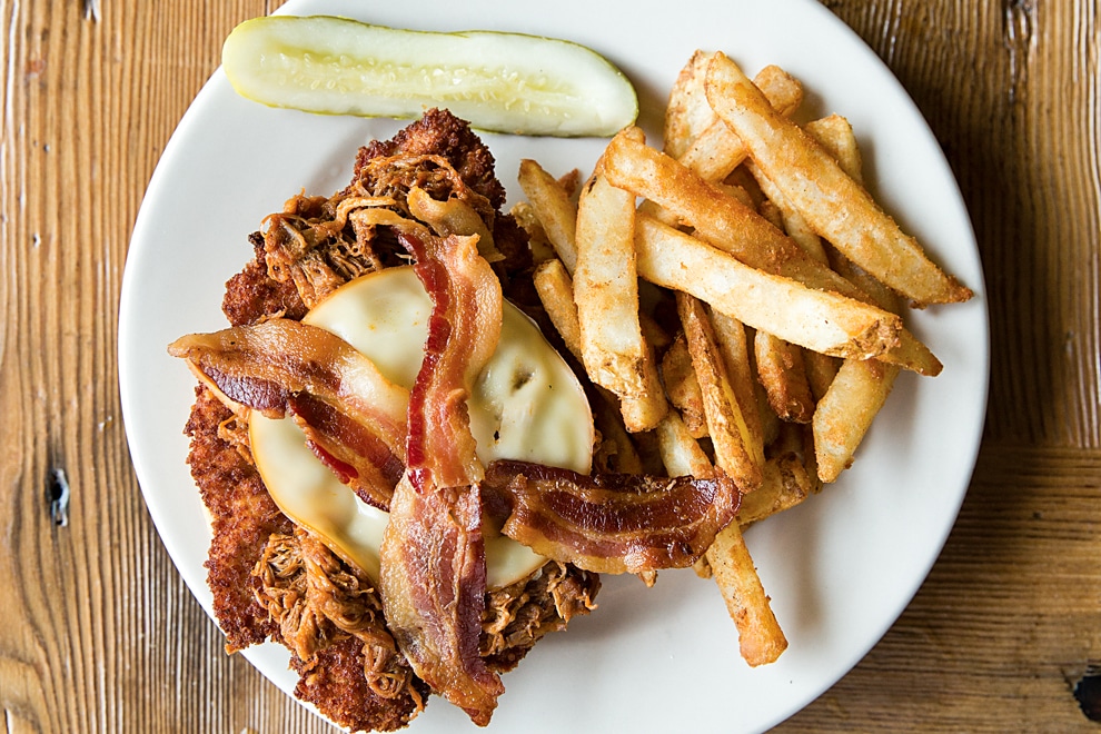 Open-face chicken sandwich with bacon and cheese at Sunrise Cafe