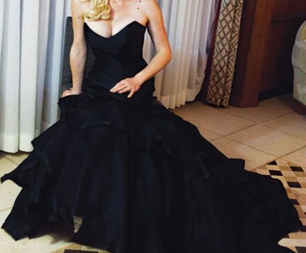 Megan Hilty in a black dress.