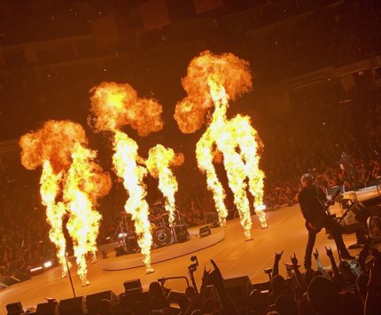 A burst of flames onstage at a concert