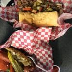 Two baskets of Italian beef sandwiches.