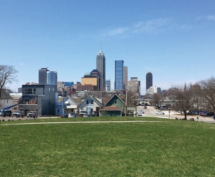 A green park overlooks downtown Indianapolis