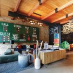 A hotel lobby with sports memoriabilia.