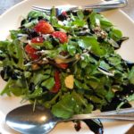 Arugula, candied walnuts, strawberries, and gorgonzola cheese with a balsamic reduction dressing.