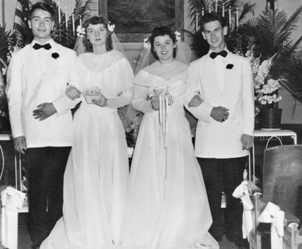 Historic black and white photo of a wedding day.