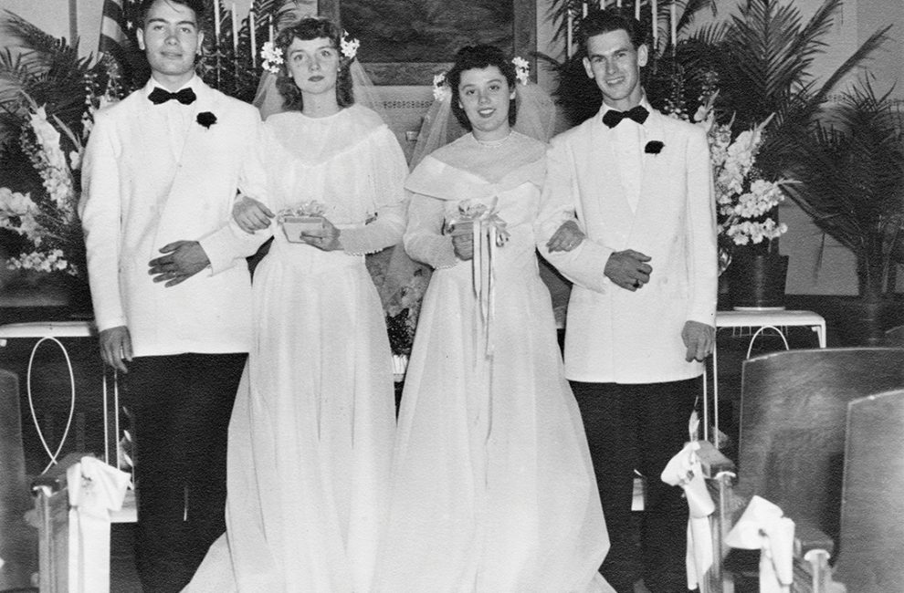 Historic black and white photo of a wedding day.