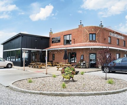 A brick building houses fun home decor.