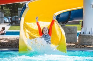 Girl enjoys the waterslides at the Seashore Water Park